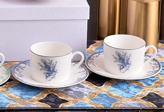 Dior cup setÂ of two tea cups with saucers